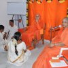 Poojya Swamiji and Ma during Guru Archana